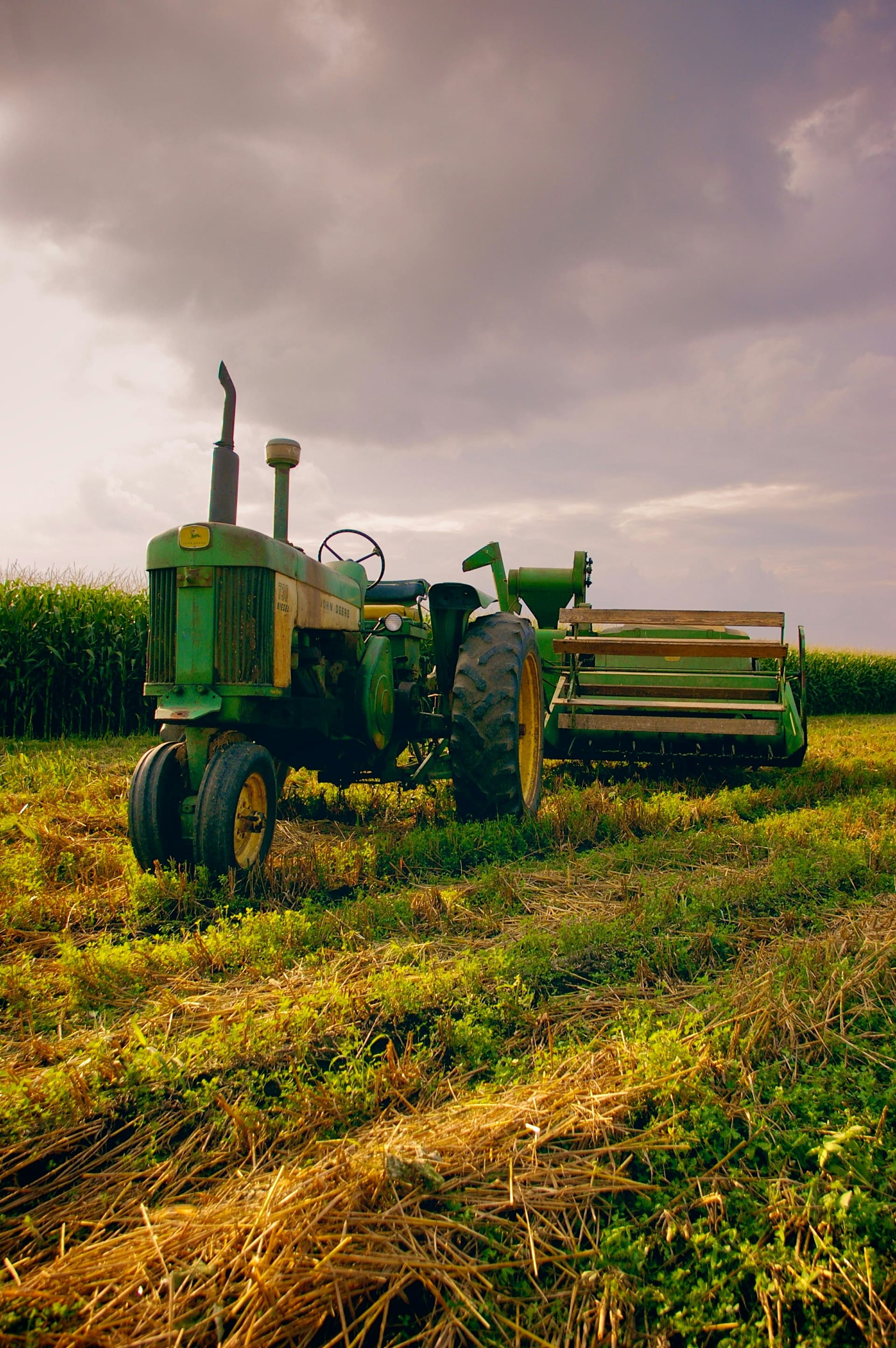 Agricultural machinery working in a rural field — visual context